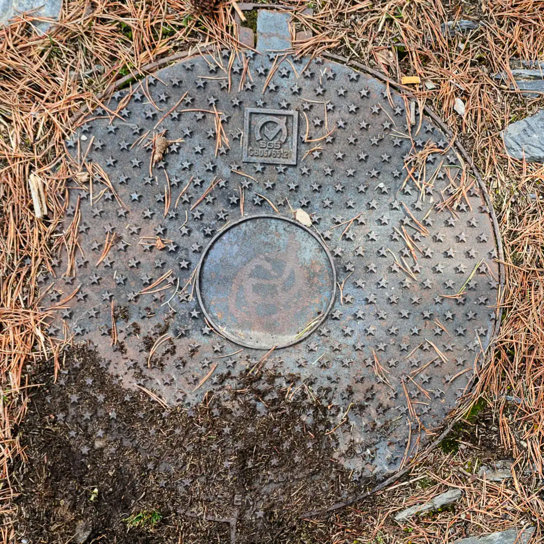 Manhole Cover by Fábregas in Prats, Andorra. Photo by Denis Marushevsky