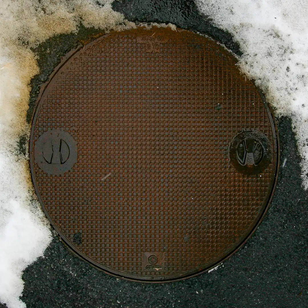 Manhole Cover by FASA in Switzerland. Photo by Yuri Matrosovich