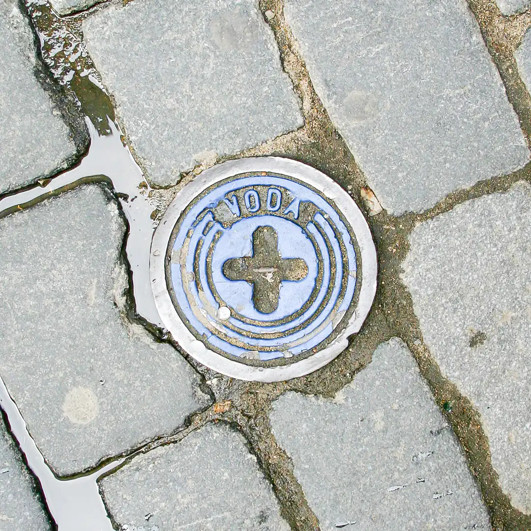 Small Water Cover in Prague, Czech Republic. Photo by Yuri Matrosovich
