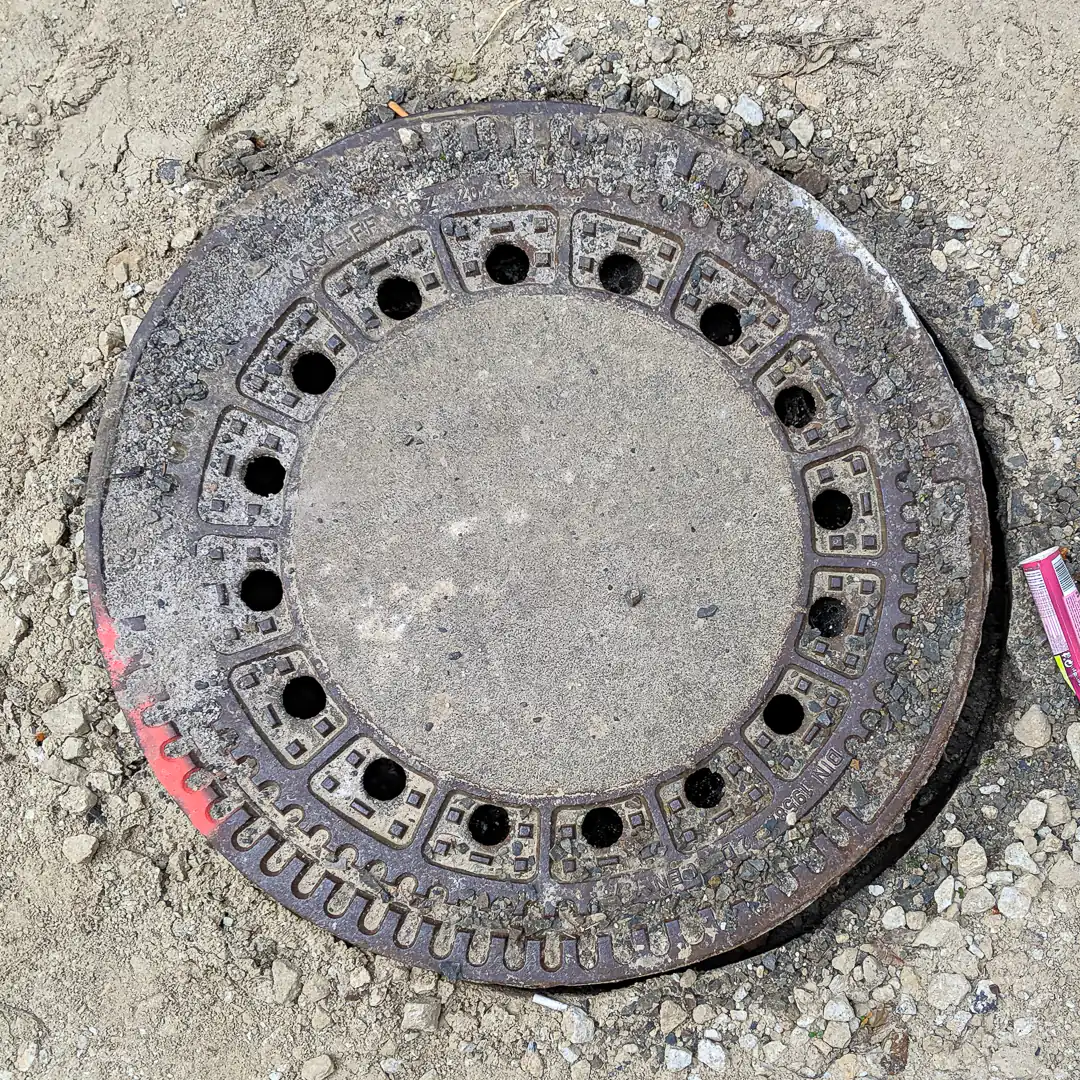 Manhole Cover by KASI in Karlovy Vary, Czech Republic. Photo by Yuri Matrosovich