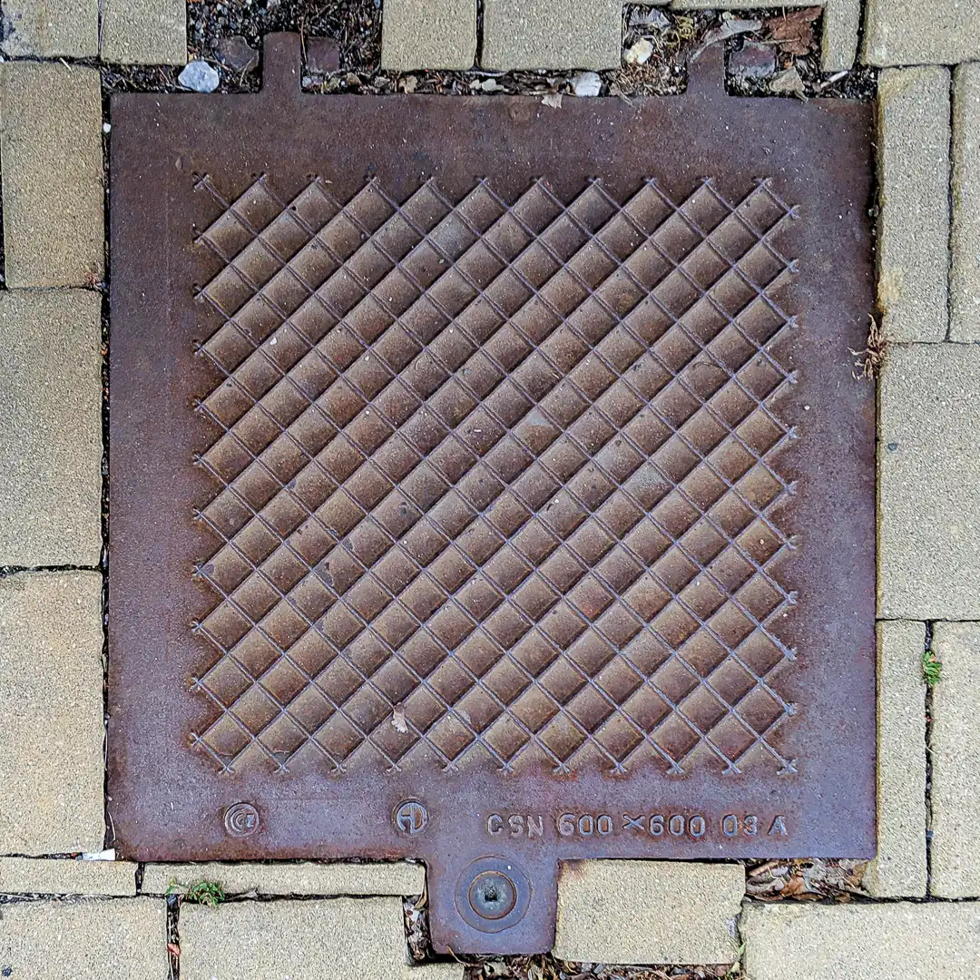 Manhole Cover in Karlovy Vary, Czech Republic. Photo by Yuri Matrosovich