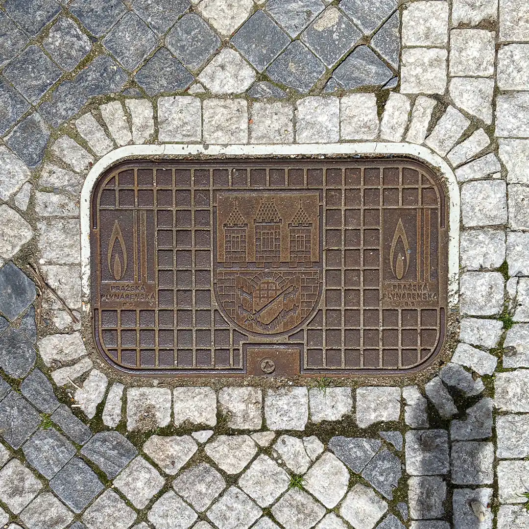 Gas Cover with Prague Coat of Arms in Prague, Czech Republic. Photo by Yuri Matrosovich