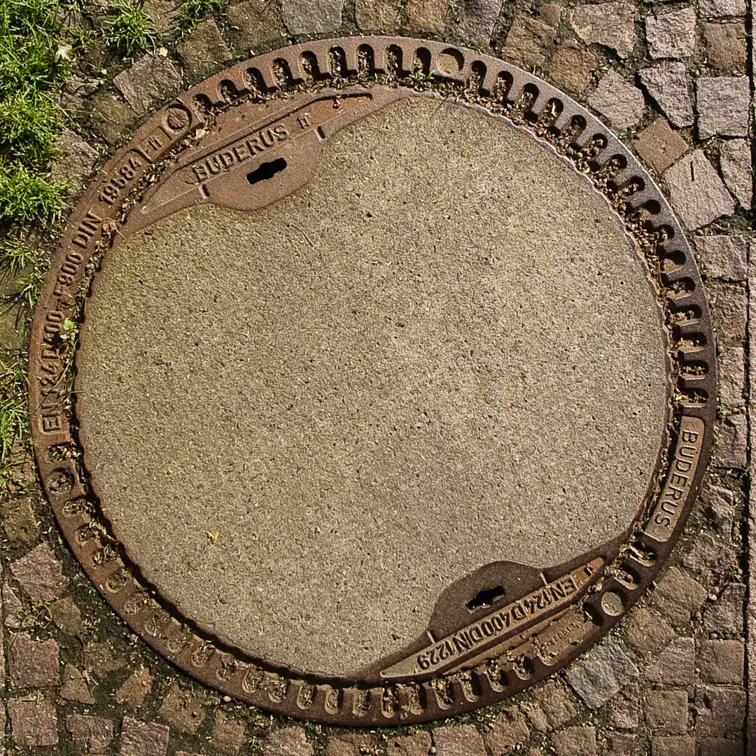 Manhole Cover by Buderus in Marburg, Germany. Photo by Yuri Matrosovich