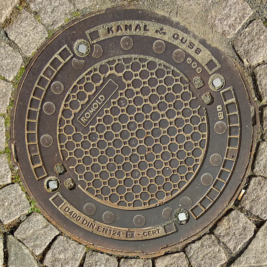 Romold Manhole Cover in Marburg, Germany. Photo by Yuri Matrosovich