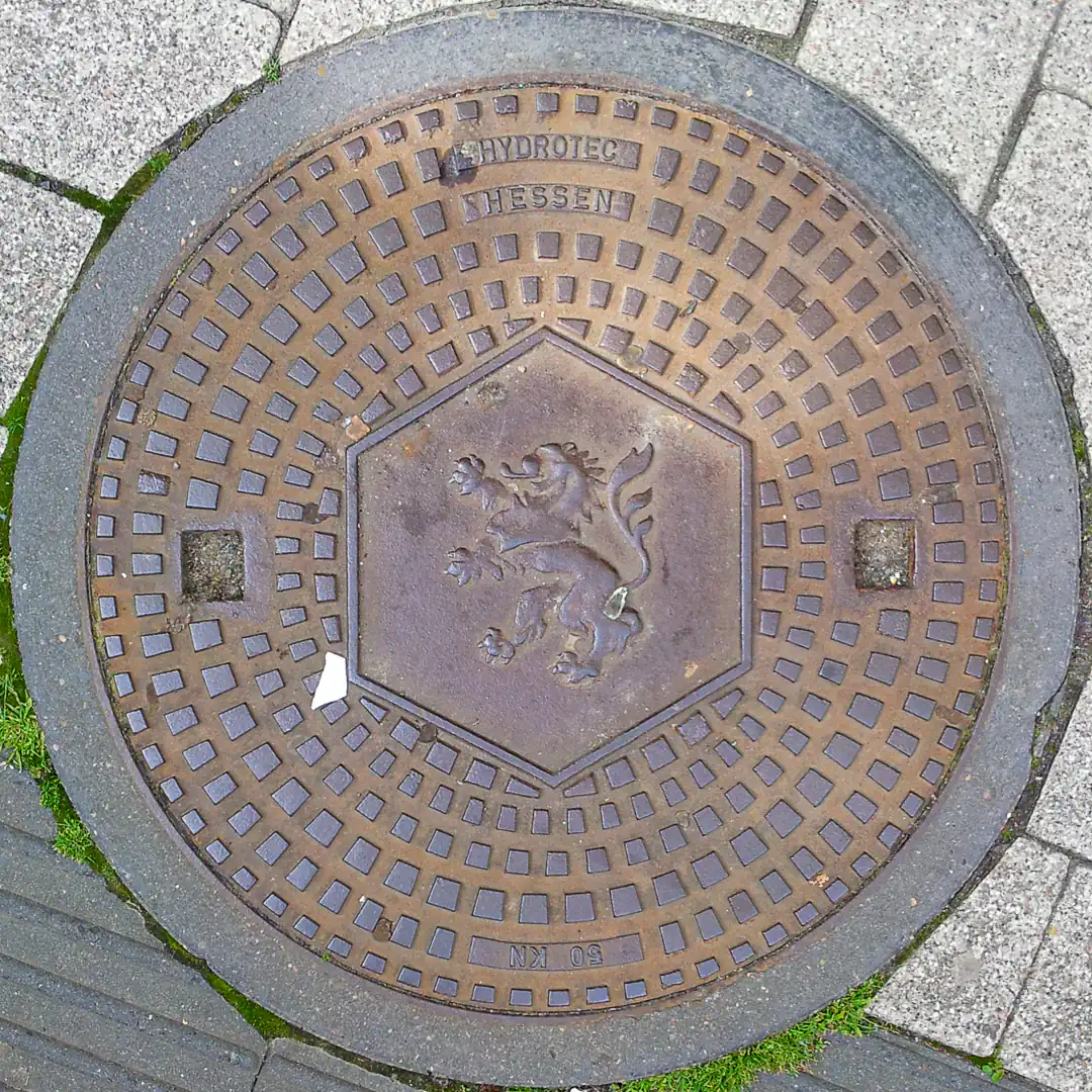 Hessen Coat of Arms Manhole Cover in Marburg, Germany. Photo by Yuri Matrosovich