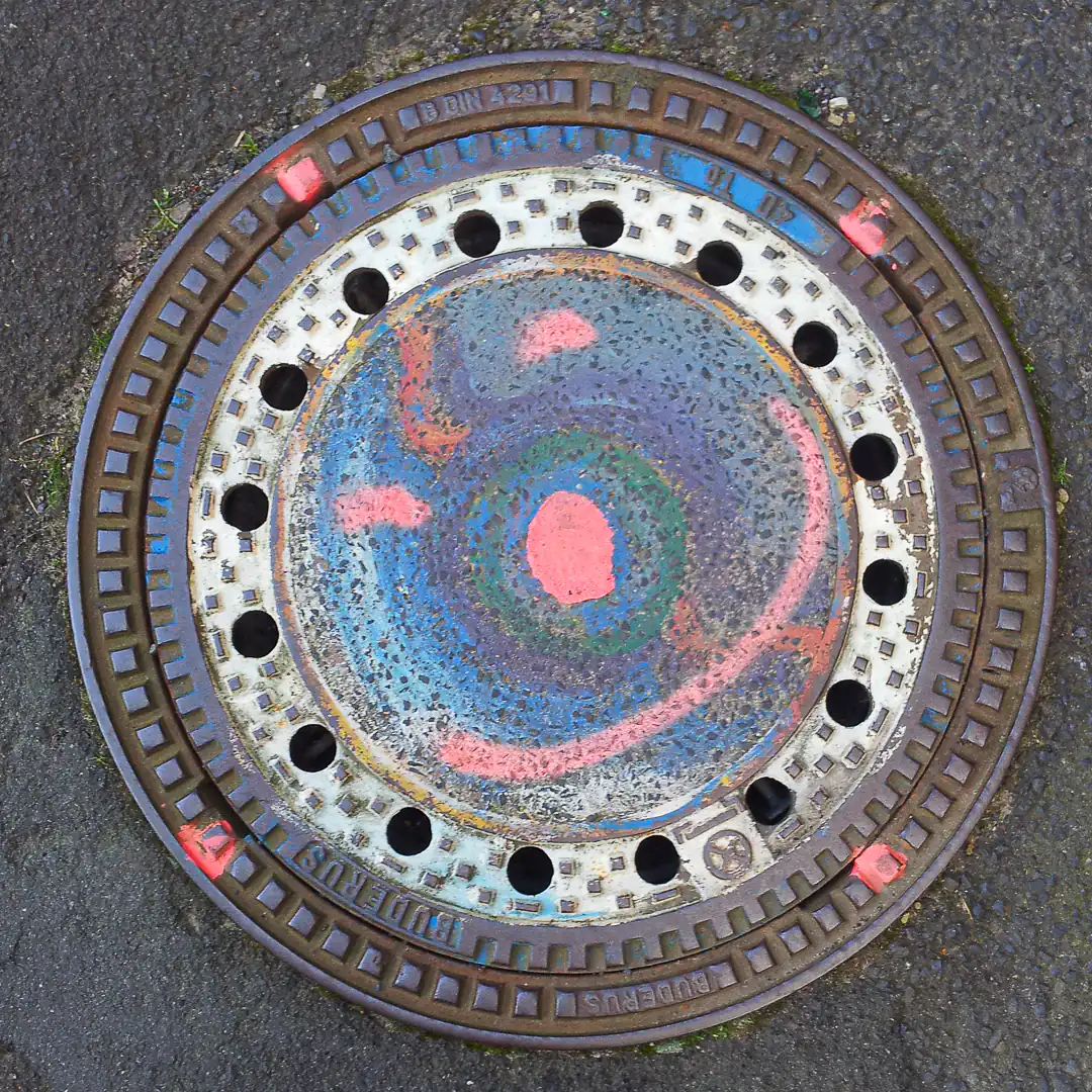 Manhole Cover by Buderus in Marburg, Germany. Photo by Yuri Matrosovich