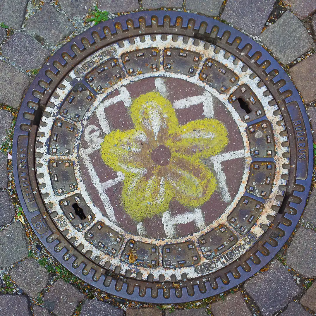 Manhole Cover by Buderus in Marburg, Germany. Photo by Yuri Matrosovich