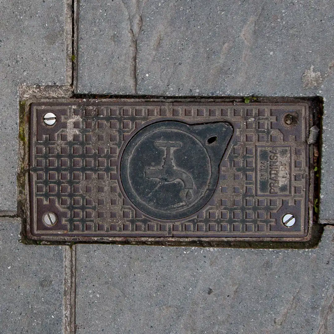 Water Manhole Cover by Pradinsa in Fuengirola, Spain. Photo by Yuri Matrosovich
