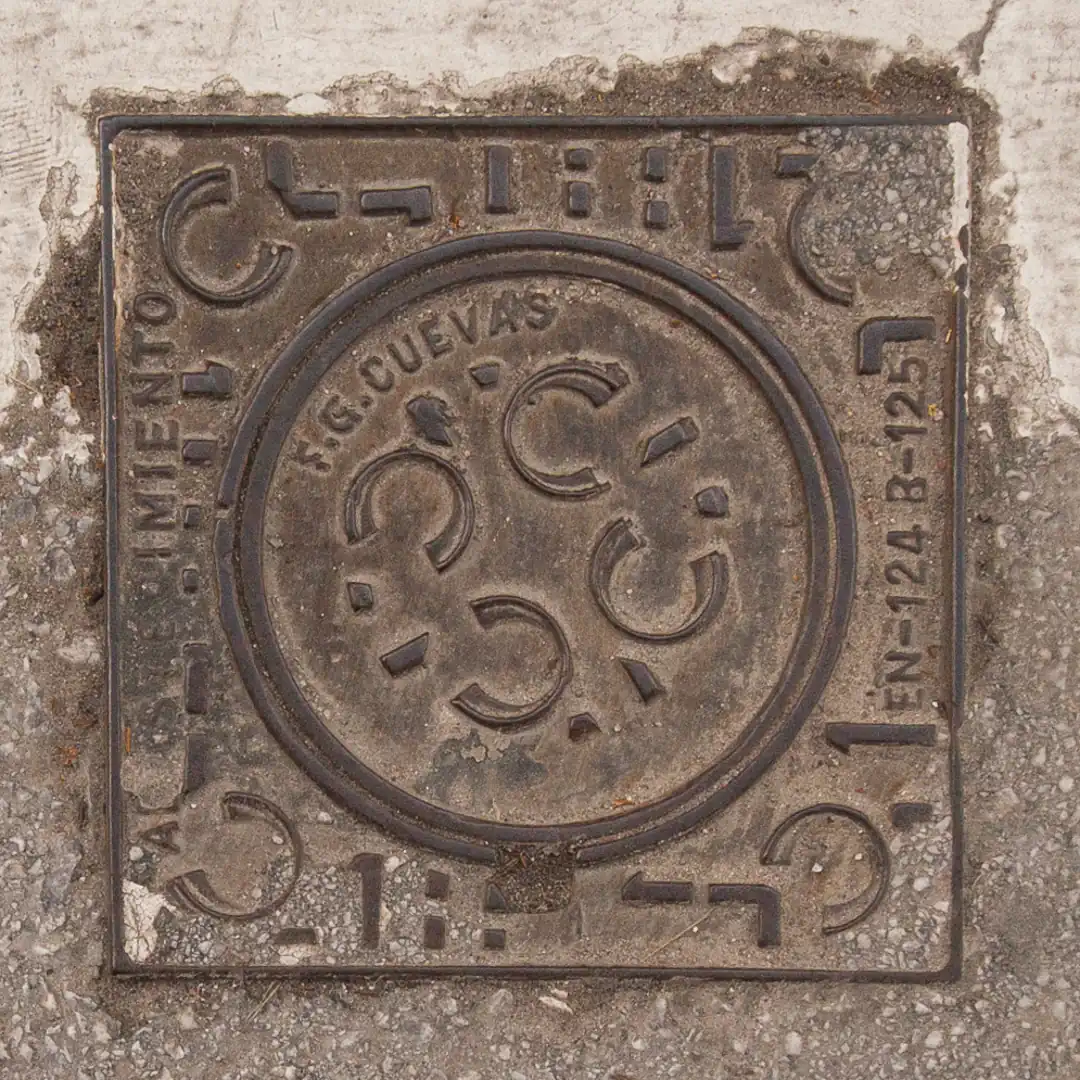 Manhole Cover in Fuengirola, Spain. Photo by Yuri Matrosovich