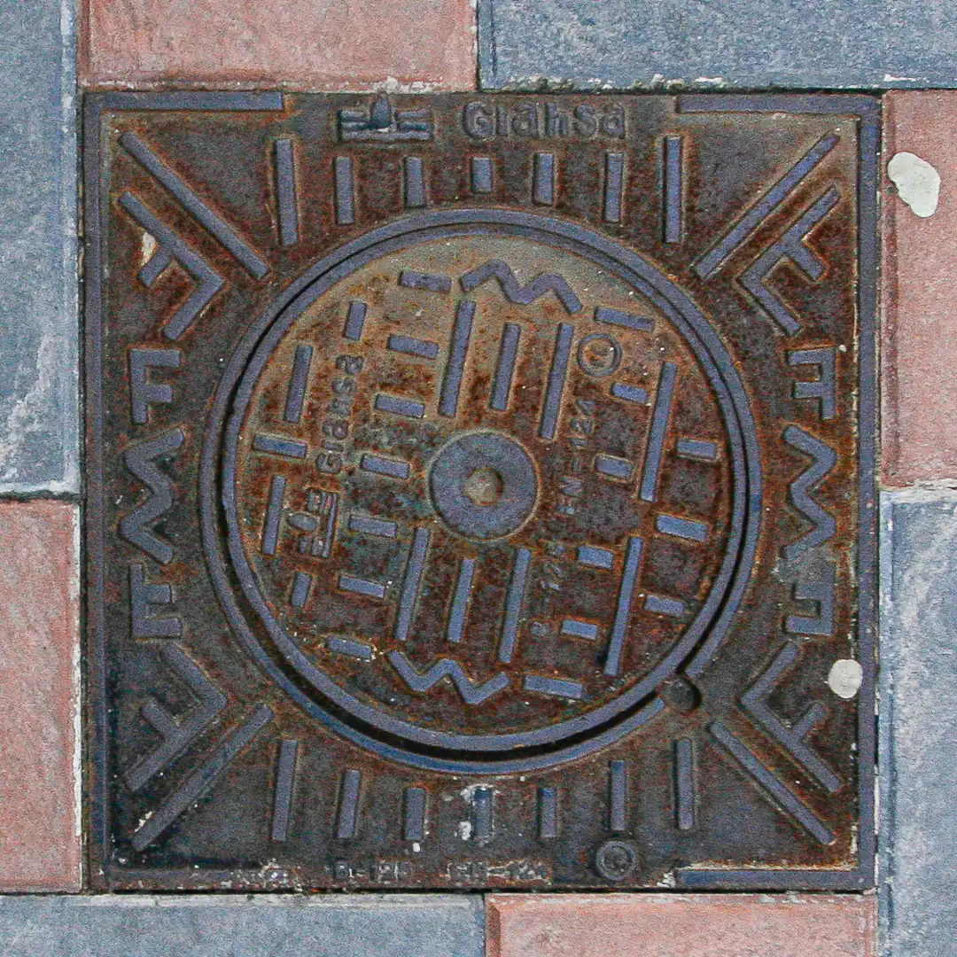 Manhole Cover in Fuengirola, Spain. Photo by Yuri Matrosovich