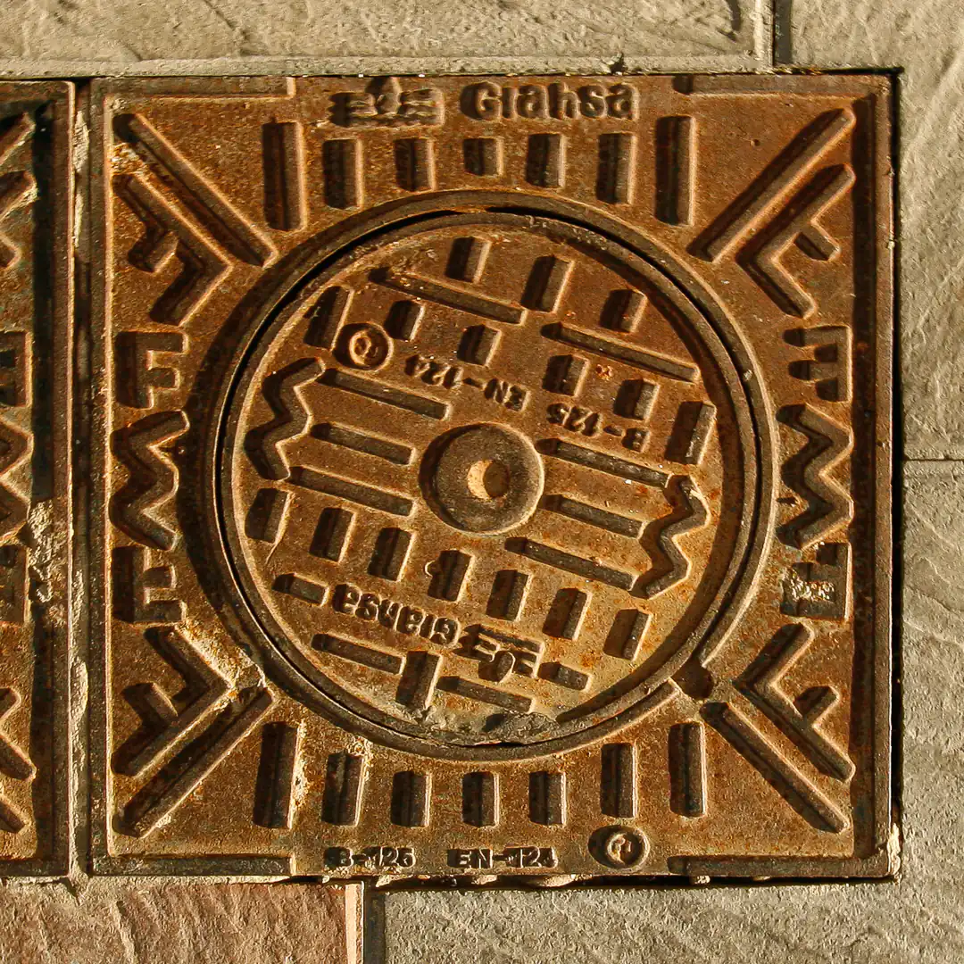 Manhole Cover in Fuengirola, Spain. Photo by Yuri Matrosovich