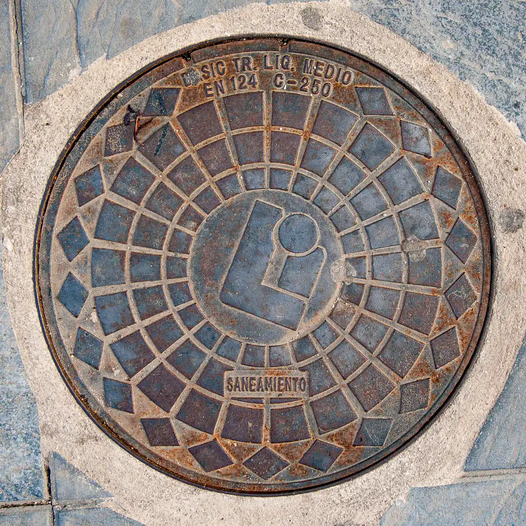 Sewerage Manhole Cover in Fuengirola, Spain. Photo by Yuri Matrosovich