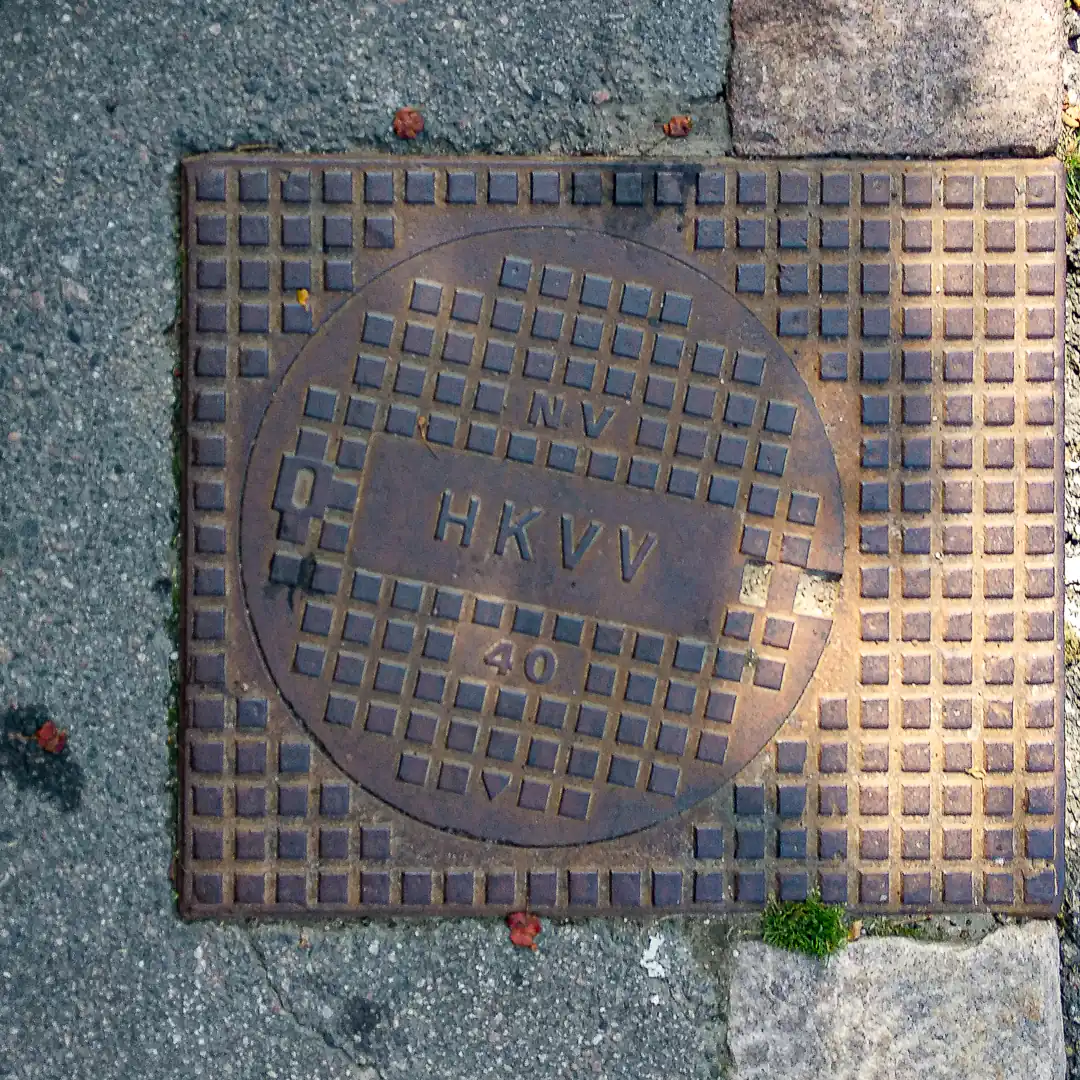 Manhole Cover in Helsinki, Finland. Photo by Yuri Matrosovich