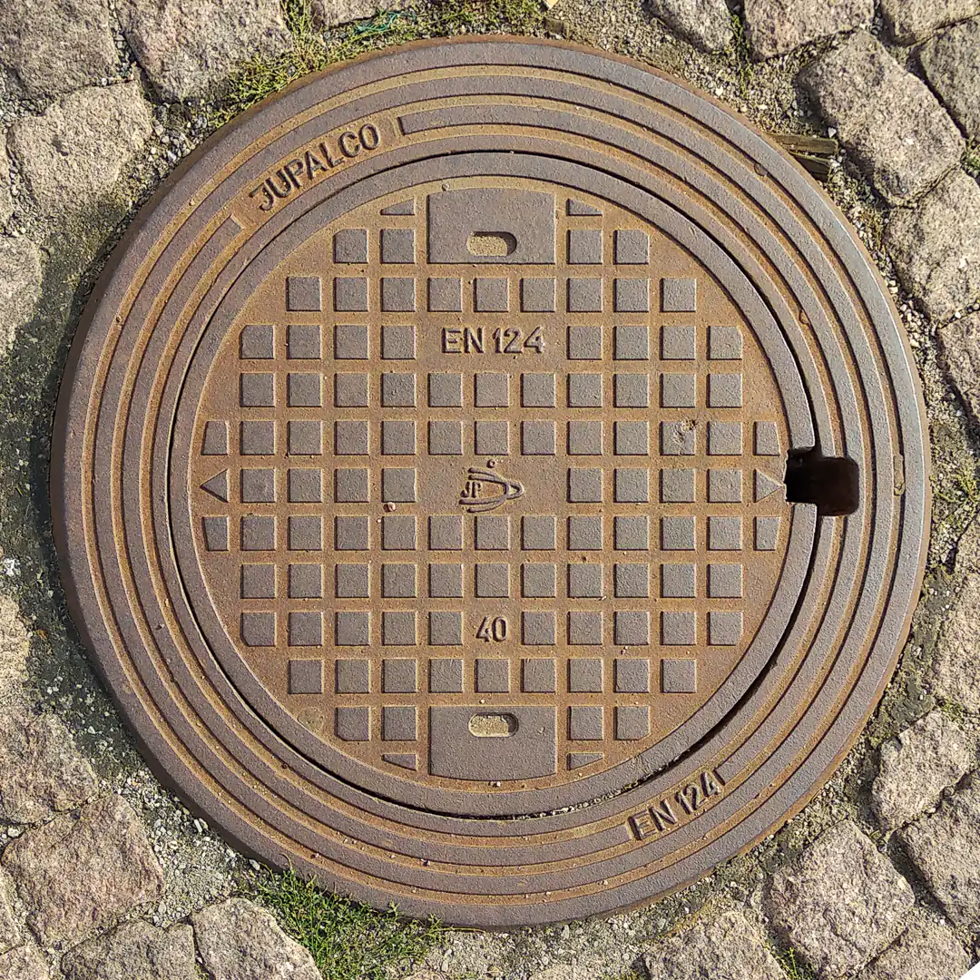 Manhole Cover by Jupalco in Helsinki, Finland. Photo by Yuri Matrosovich