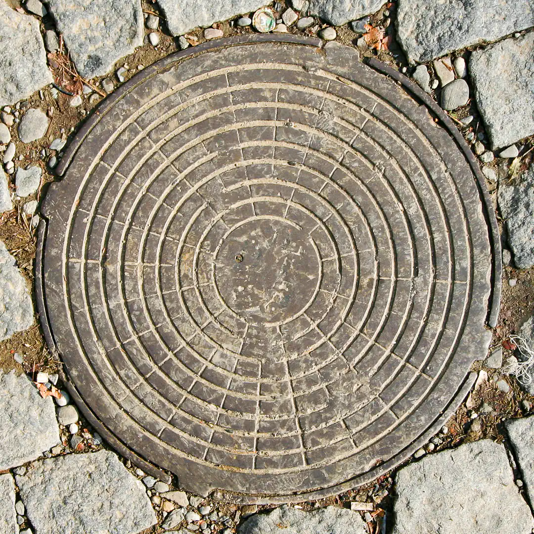 Manhole Cover in Tbilisi, Georgia. Photo by Yuri Matrosovich