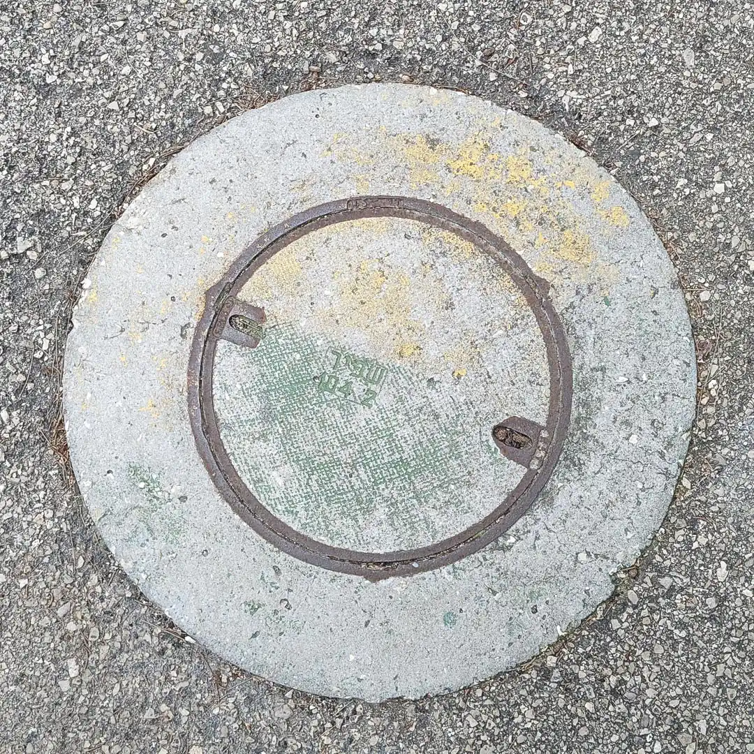 Manhole Cover in Haifa, Israel. Photo by Yuri Matrosovich