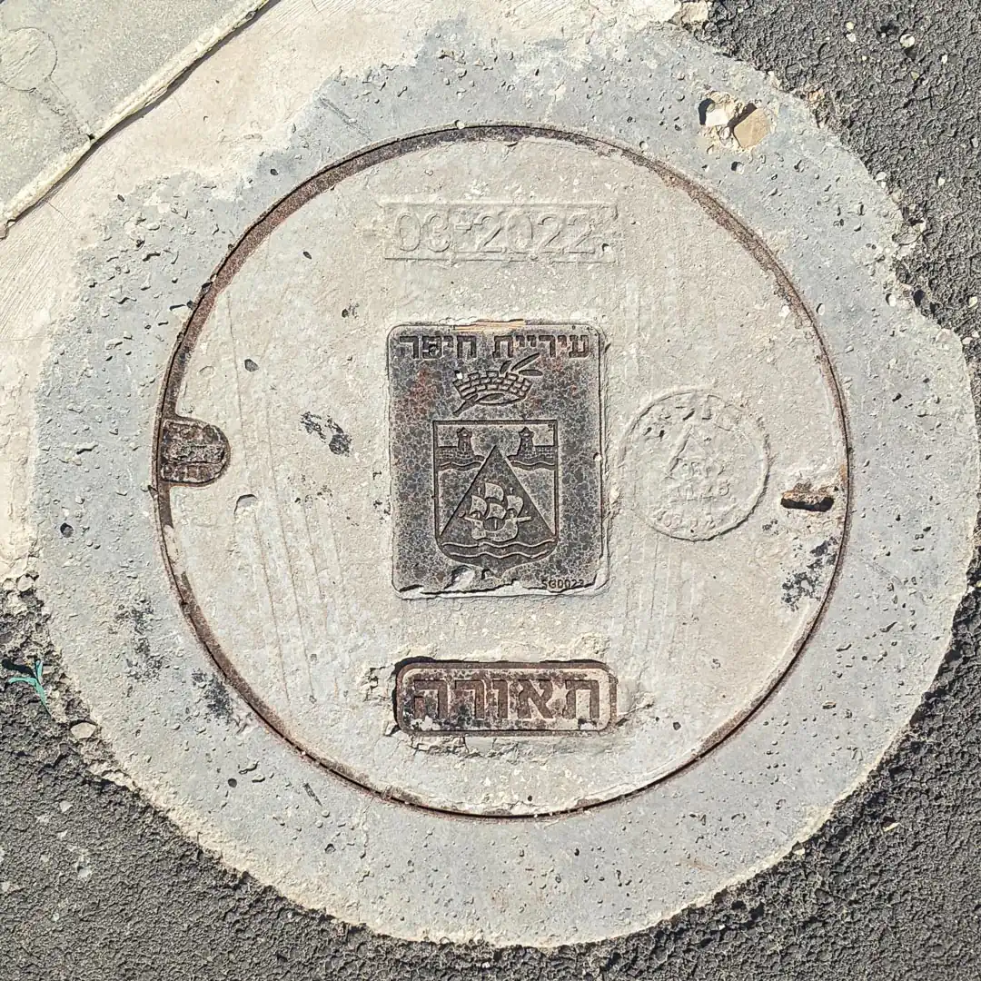 Lighting Manhole Cover in Haifa, Israel. Photo by Yuri Matrosovich