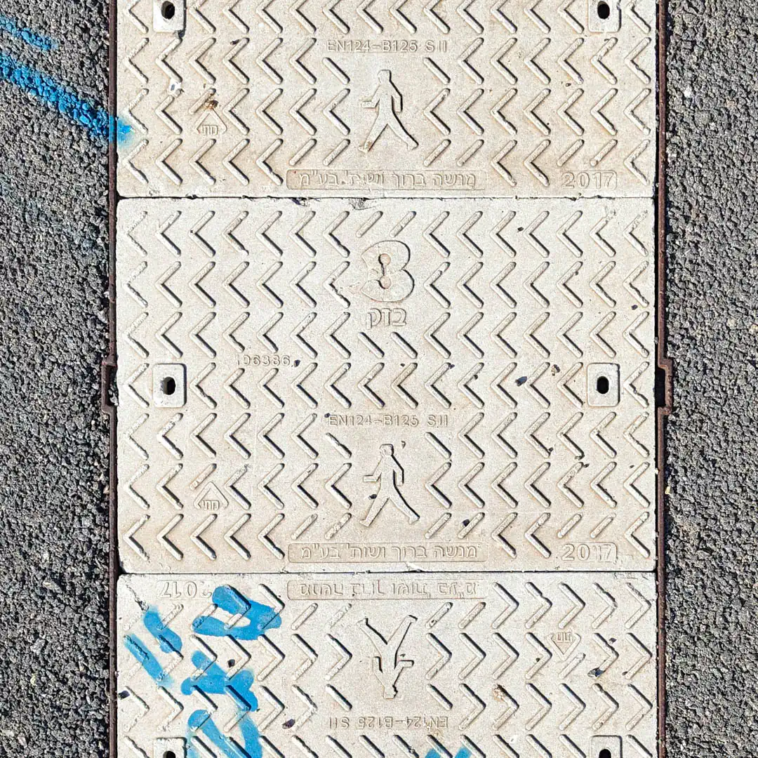 Cable Manhole Cover in Atlit, Israel. Photo by Yuri Matrosovich