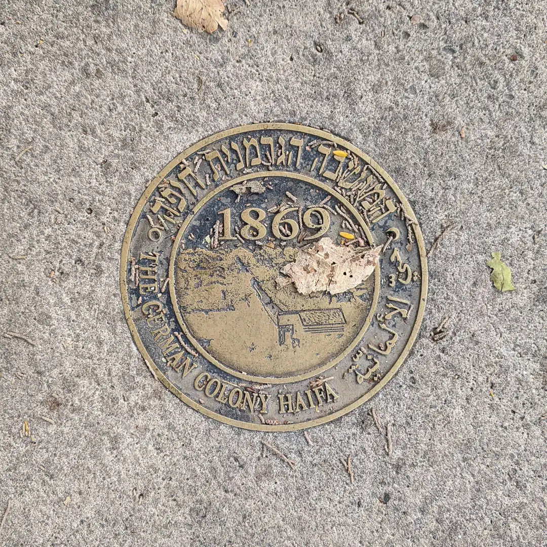 Info Manhole Cover in Haifa, Israel. Photo by Yuri Matrosovich