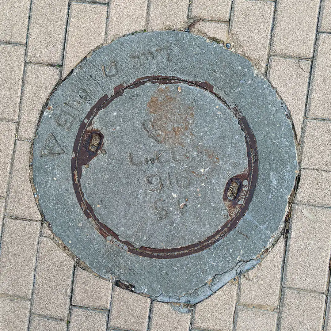 Manhole Cover in Caesaria, Israel. Photo by Yuri Matrosovich