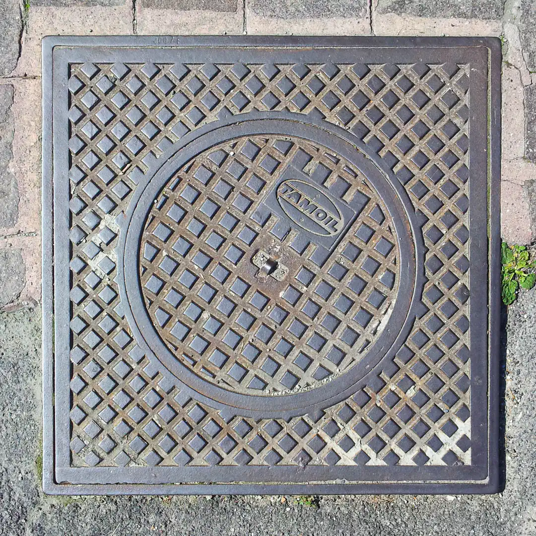 Tamoil Manhole Cover in Bellagio, Italy. Photo by Yuri Matrosovich