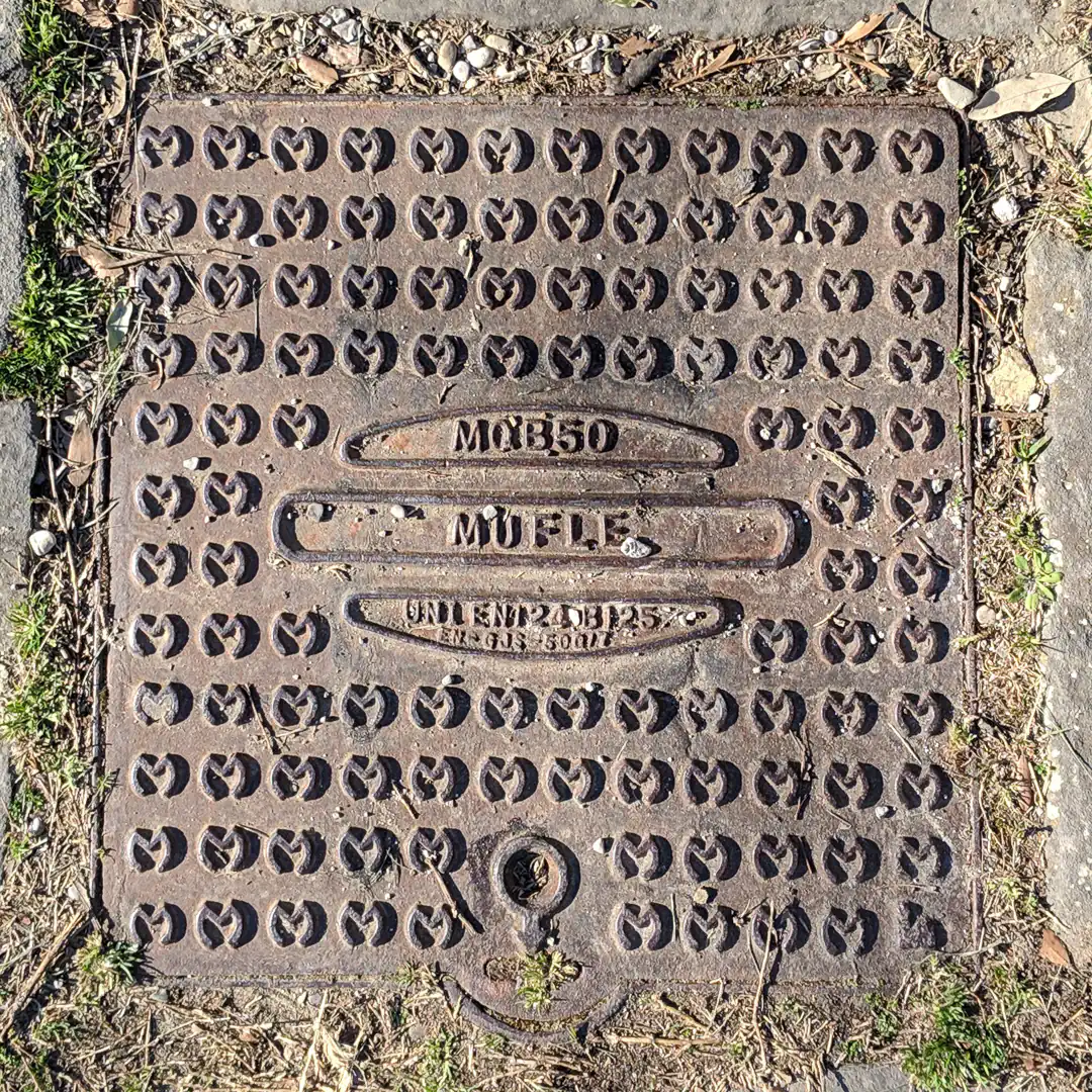 Manhole Cover by Mufle in Florence, Italy. Photo by Yuri Matrosovich