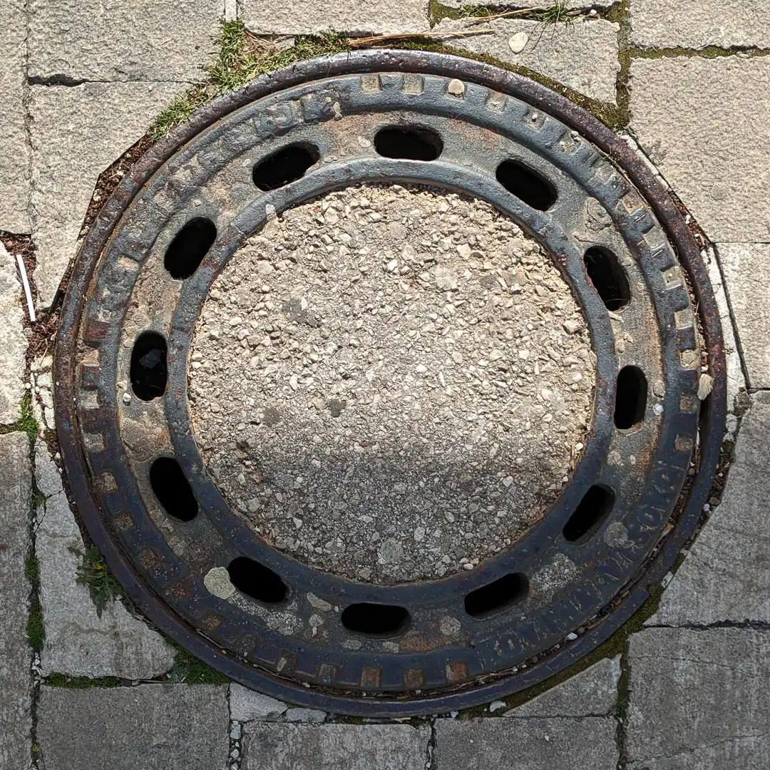 Manhole Cover in Cetinje, Montenegro. Photo by Denis Panin
