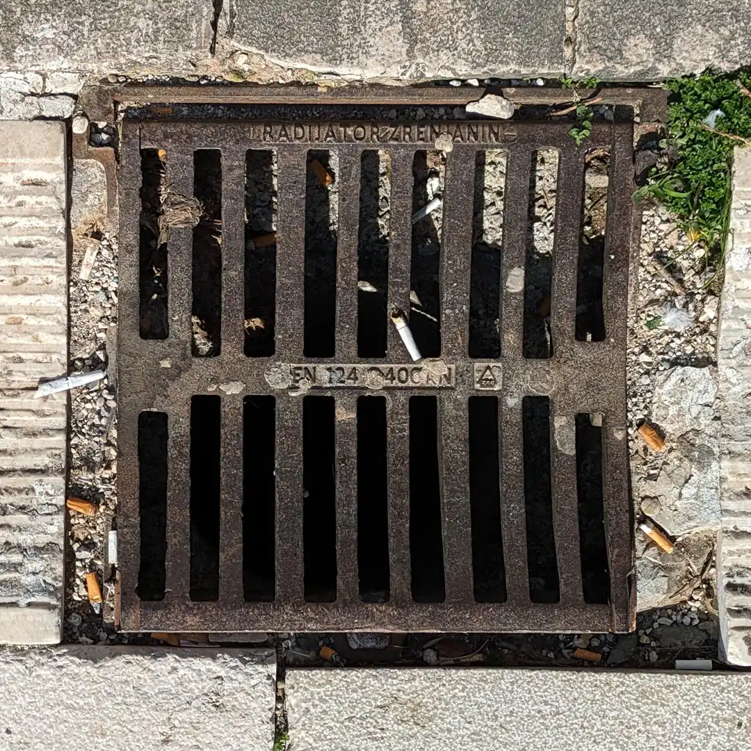 Drainage Manhole Cover by Radijator Zrenjanin in Cetinje, Montenegro. Photo by Denis Panin