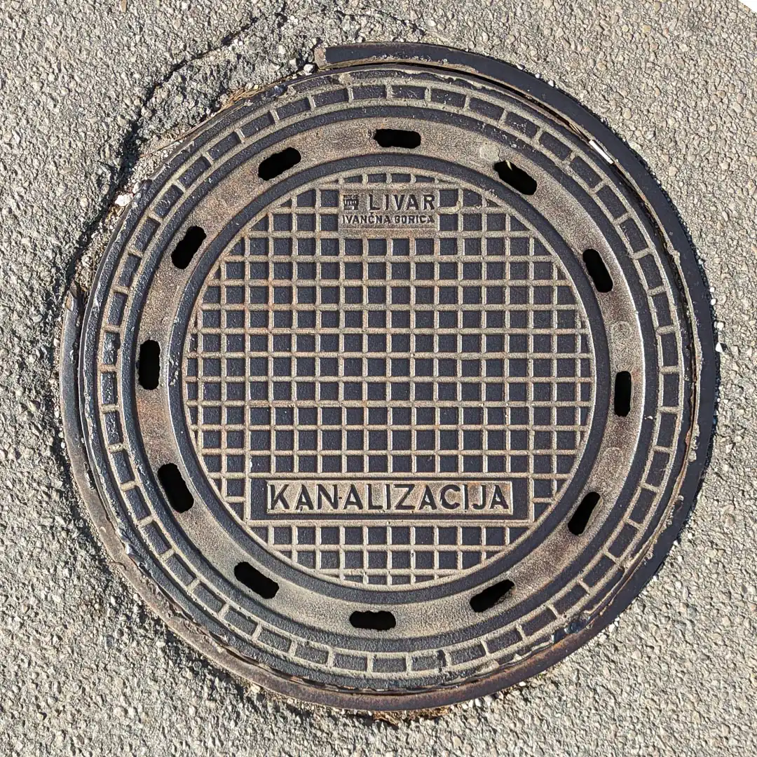 Sewerage Manhole Cover in Cetinje, Montenegro. Photo by Denis Panin
