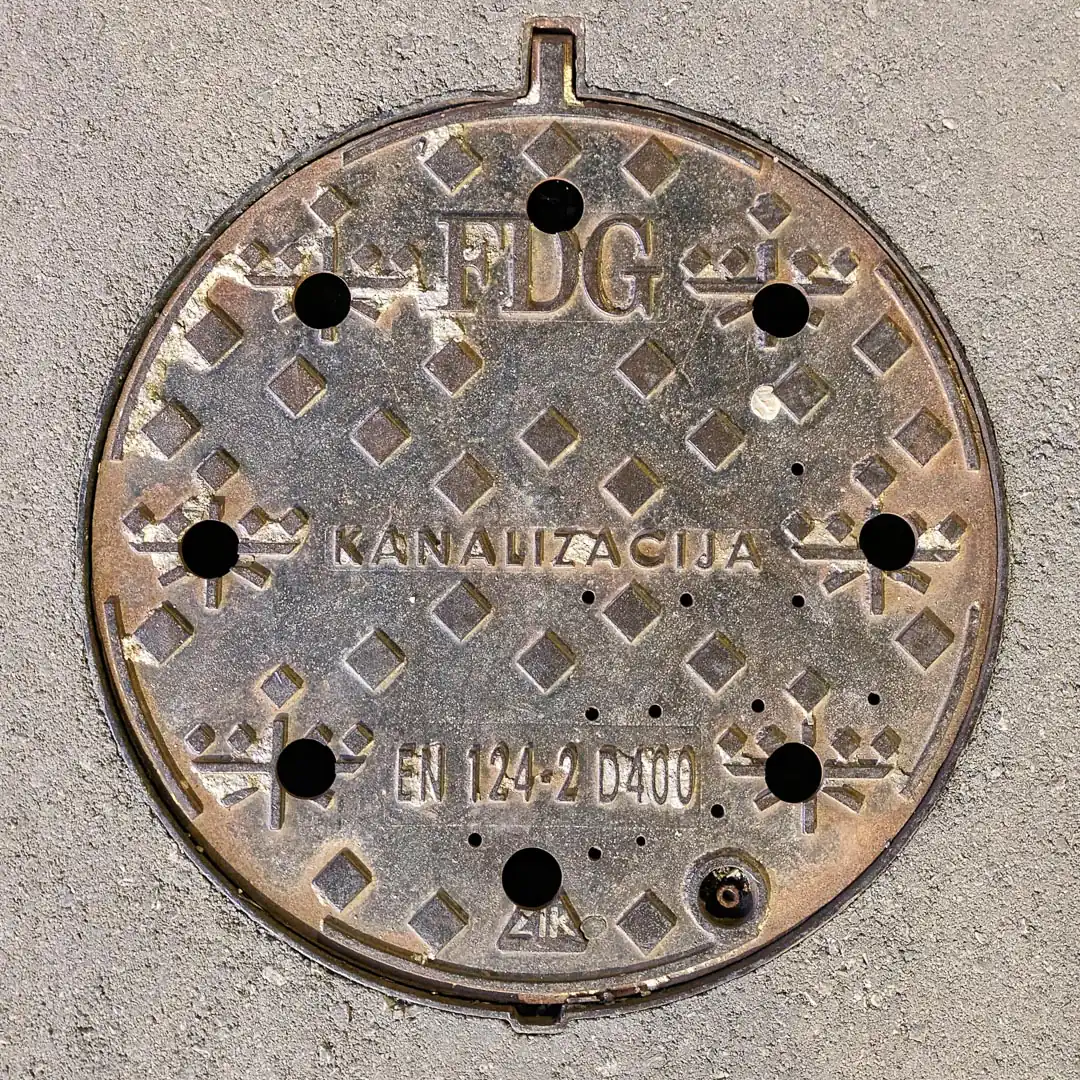 Sewerage Manhole Cover in Lješevići, Montenegro. Photo by Denis Panin