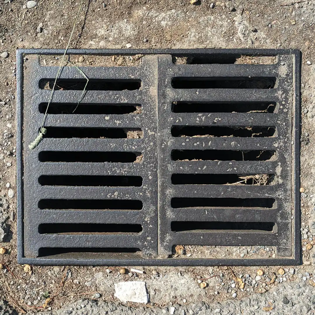 Drainage Manhole Cover in Podgorica, Montenegro. Photo by Denis Panin