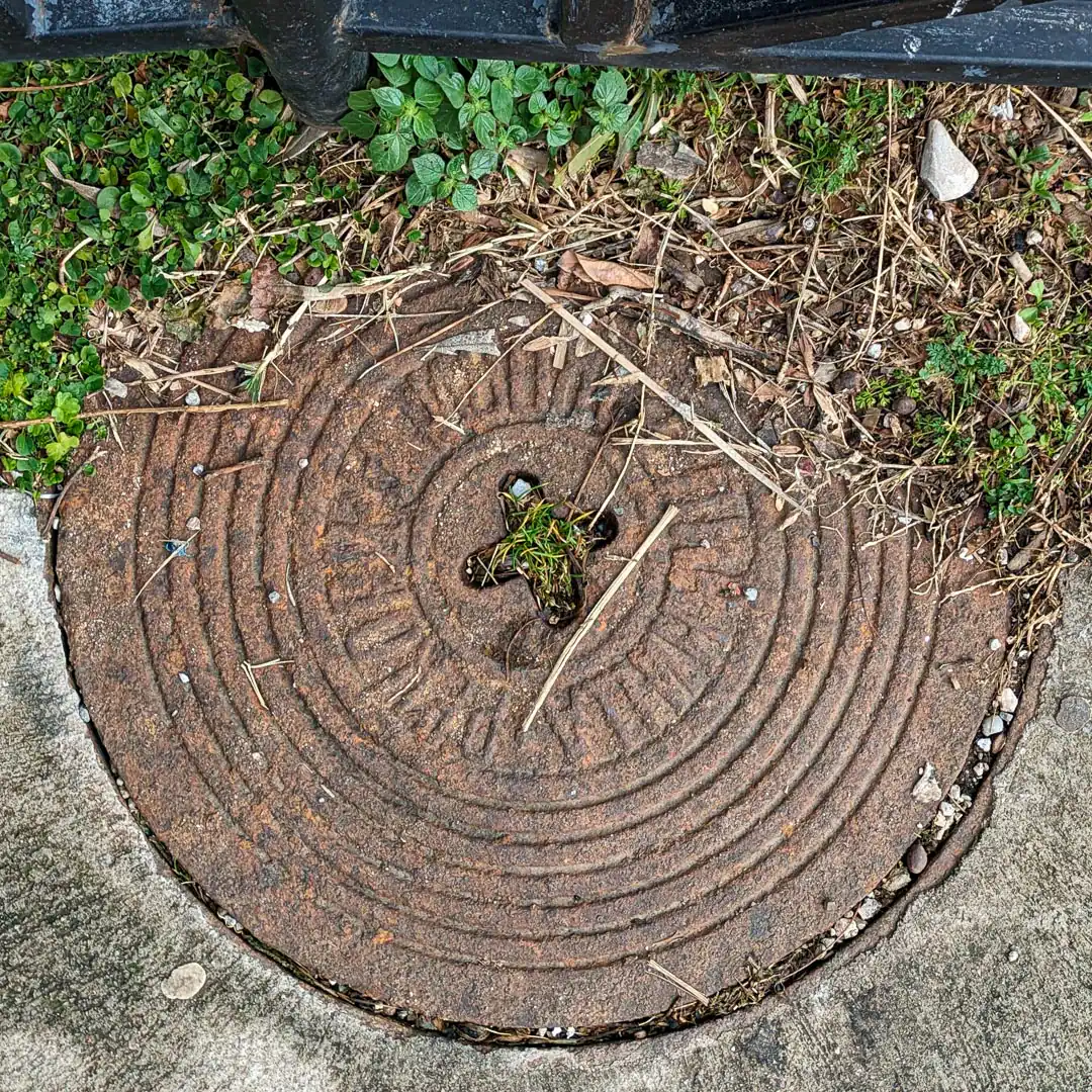 Manhole Cover in Budva, Montenegro. Photo by Denis Panin