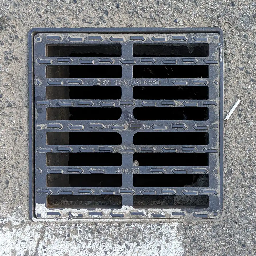Drainage Manhole Cover in Podgorica, Montenegro. Photo by Denis Panin