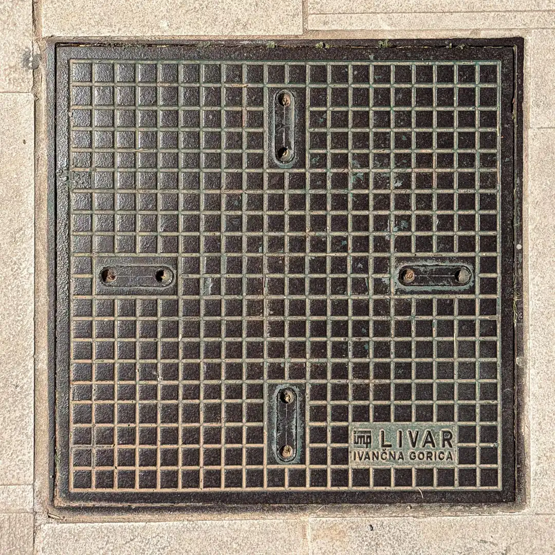 Manhole Cover by Livar in Budva, Montenegro. Photo by Denis Panin
