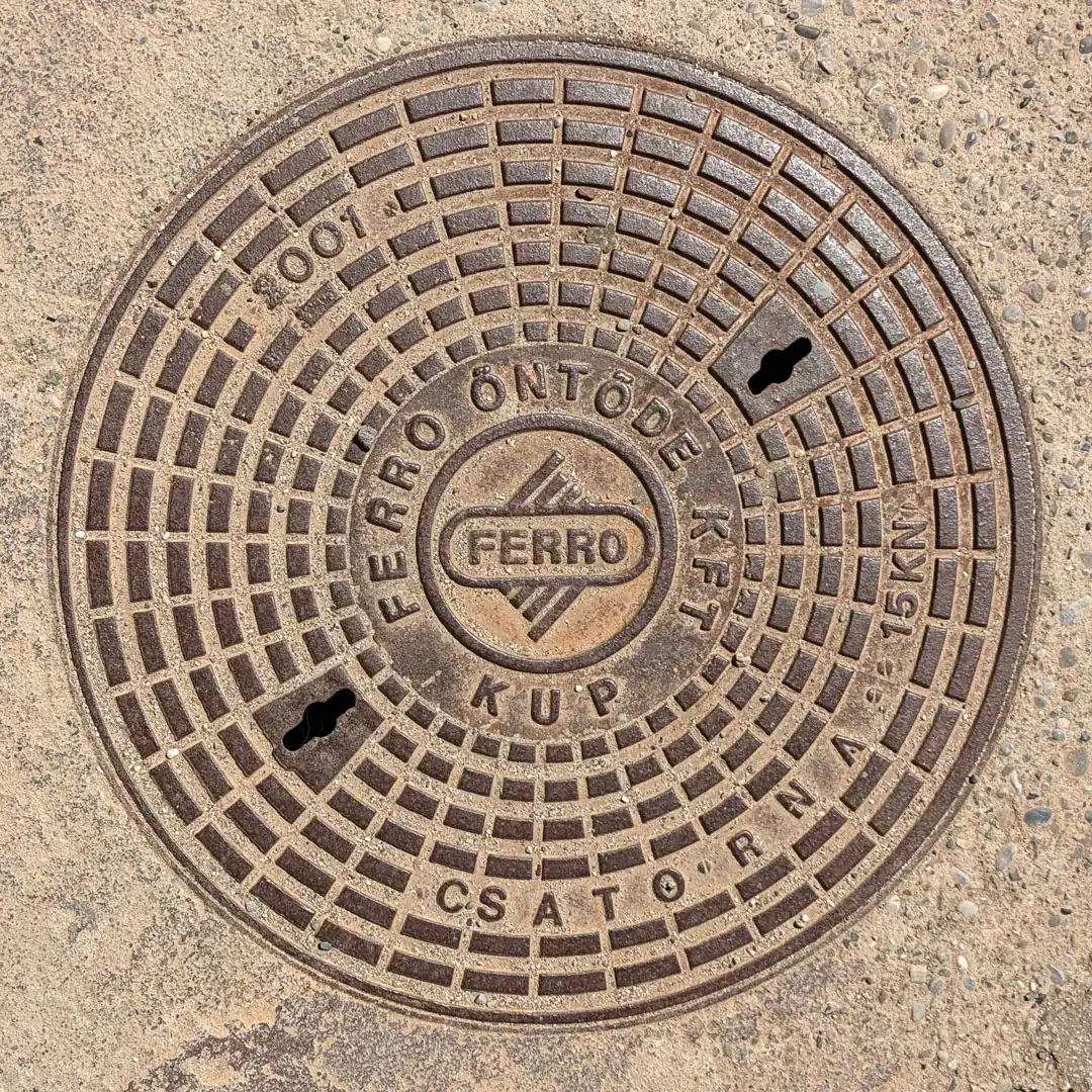 Manhole Cover by Ferro Öntöde in Budva, Montenegro. Photo by Denis Panin
