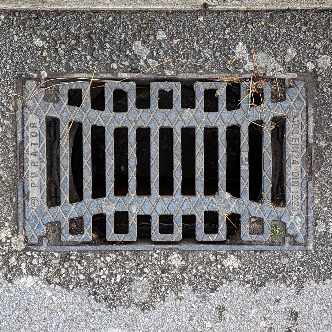 Drainage Manhole Cover in Budva, Montenegro. Photo by Denis Panin