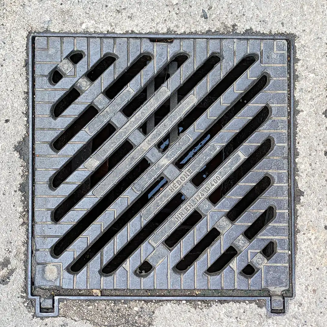 Drainage Manhole Cover by Hedone in Budva, Montenegro. Photo by Denis Panin