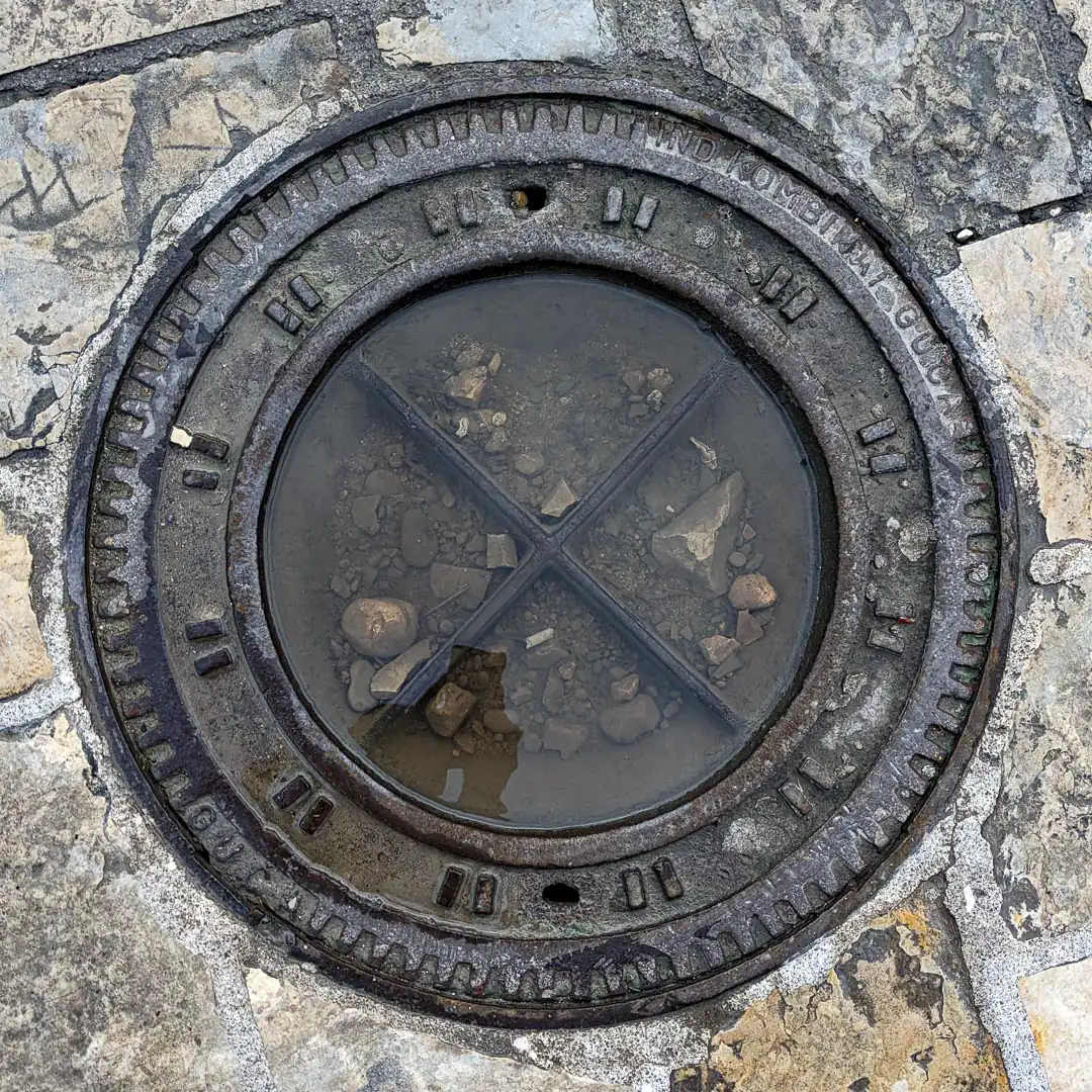 Manhole Cover by IKL Livnica in Budva, Montenegro. Photo by Denis Panin