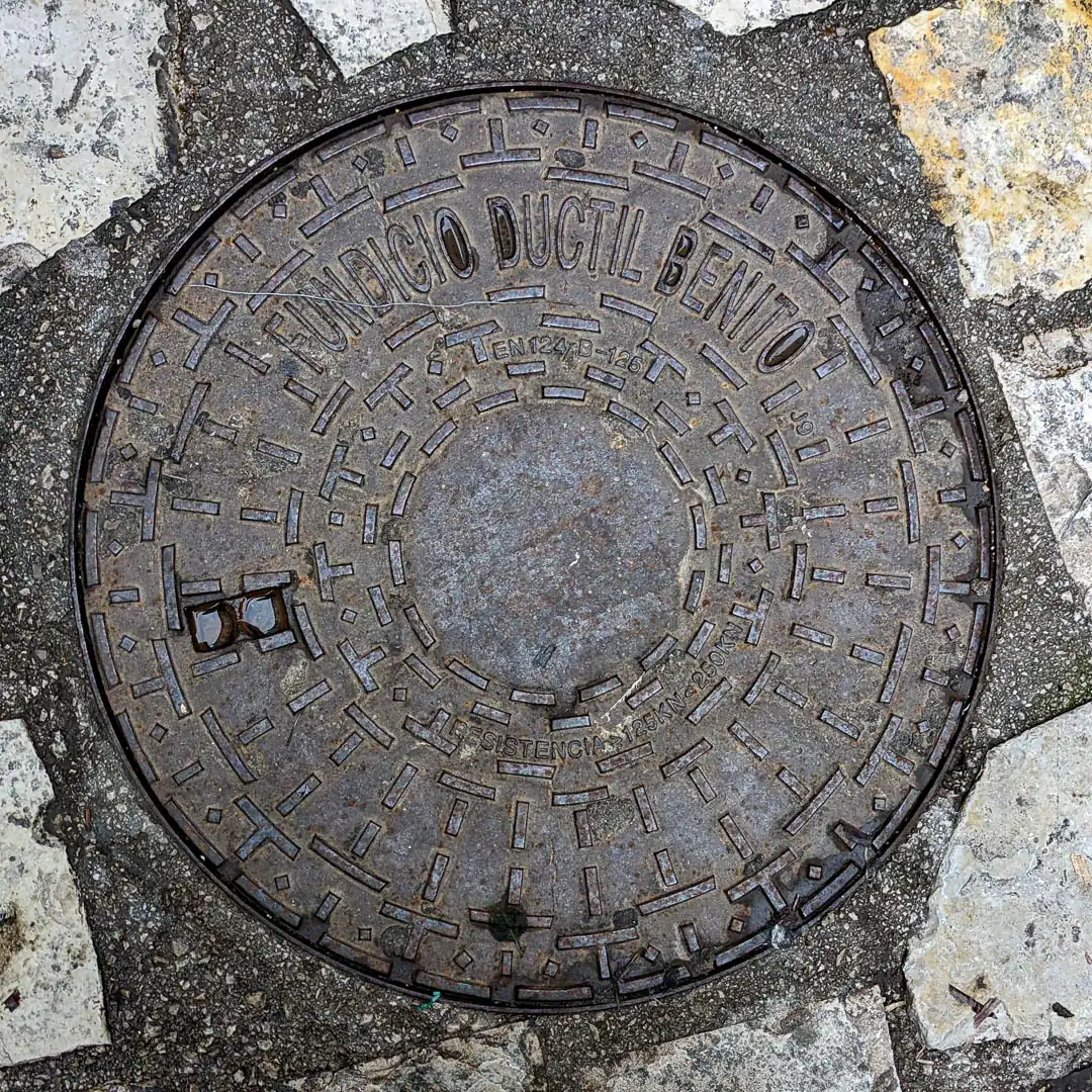 Manhole Cover by Fundició Dúctil Benito in Budva, Montenegro. Photo by Denis Panin