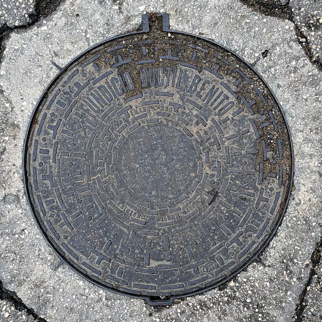 Manhole Cover by Fundició Dúctil Benito in Budva, Montenegro. Photo by Denis Panin