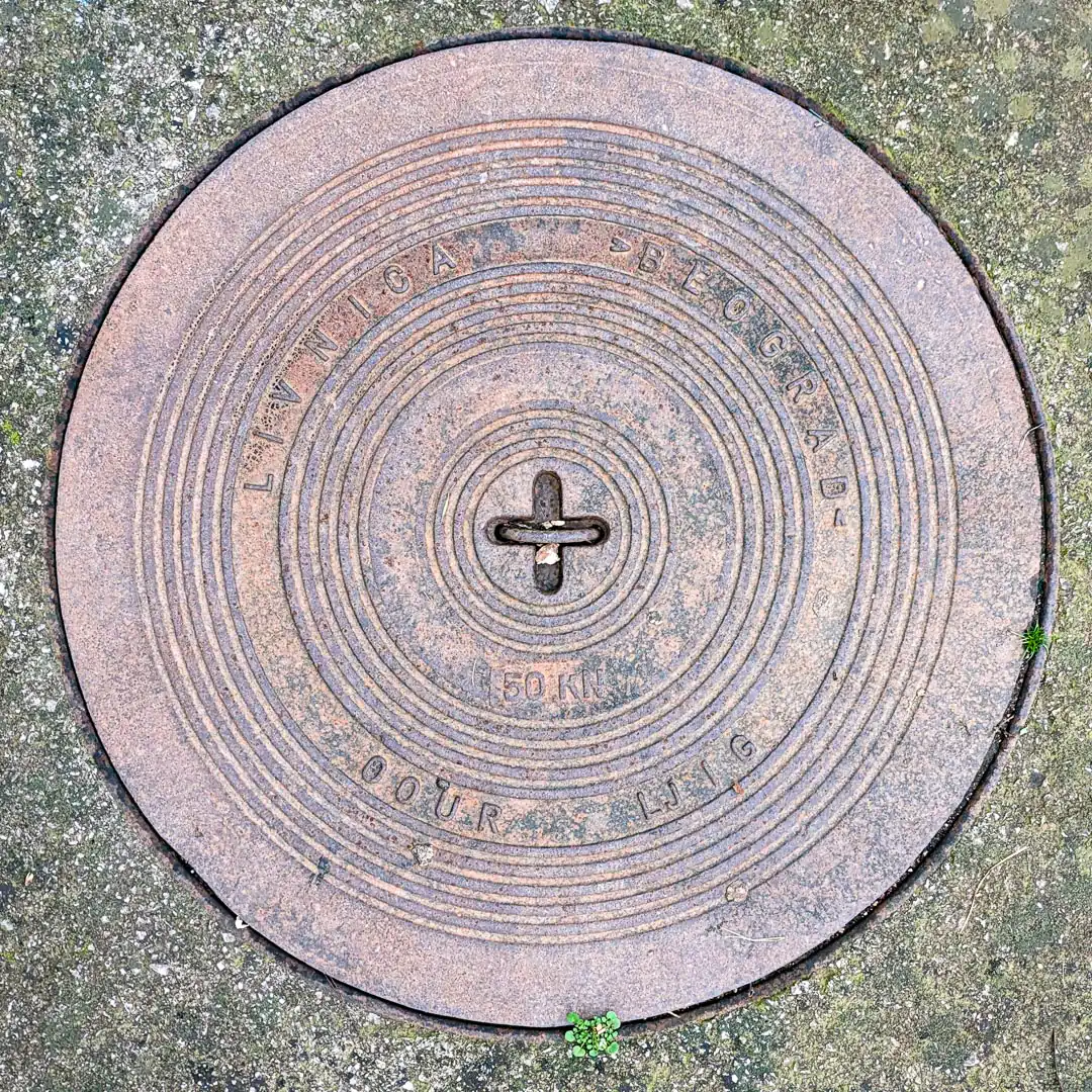 Manhole Cover by Livnica Ljig in Budva, Montenegro. Photo by Denis Panin