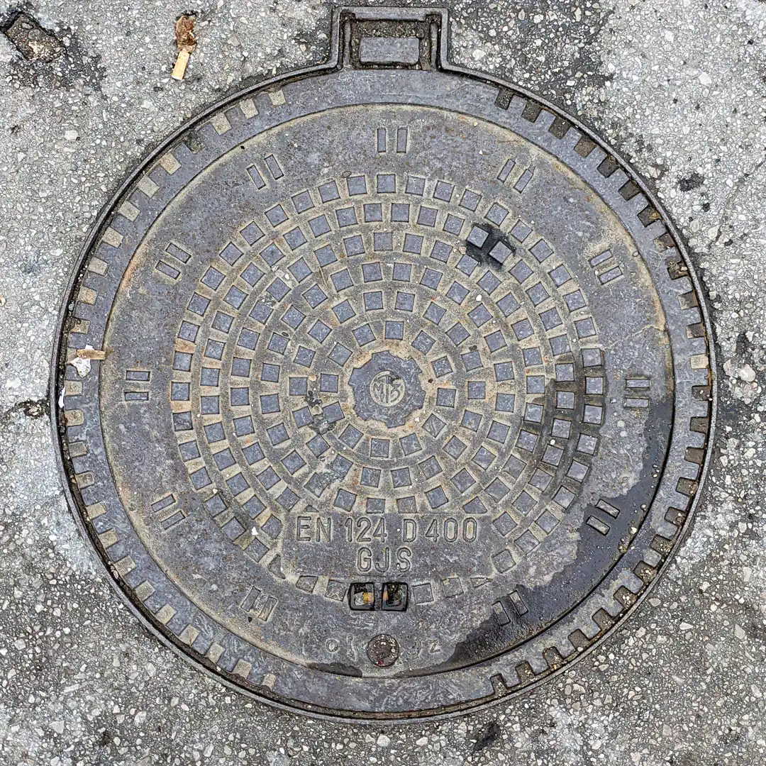 Manhole Cover by МТЗ in Budva, Montenegro. Photo by Denis Panin