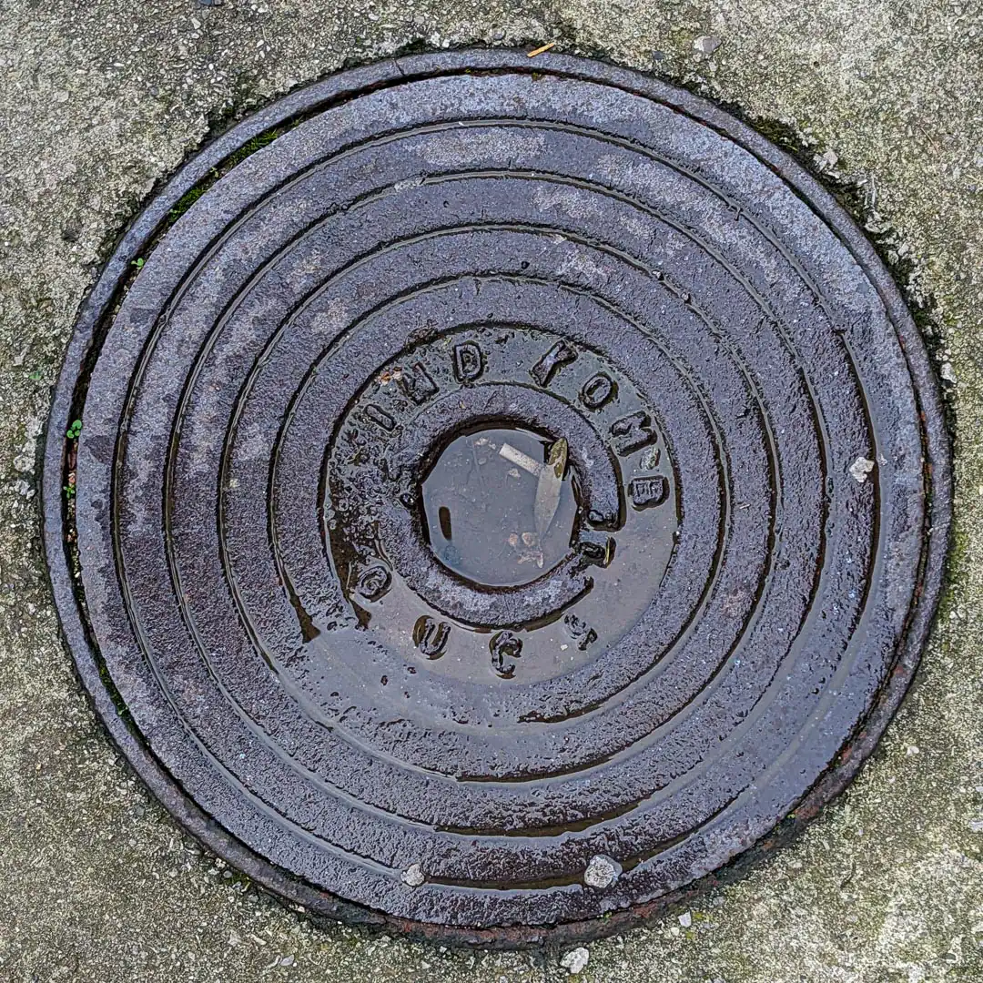 Manhole Cover by IKL Livnica in Budva, Montenegro. Photo by Denis Panin