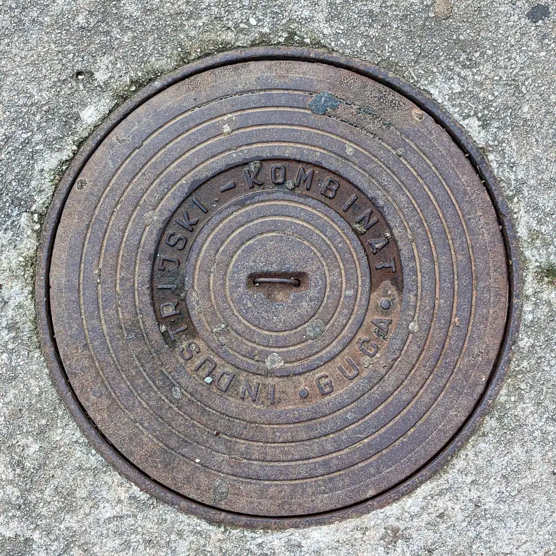 Manhole Cover by IKL Livnica in Budva, Montenegro. Photo by Denis Panin