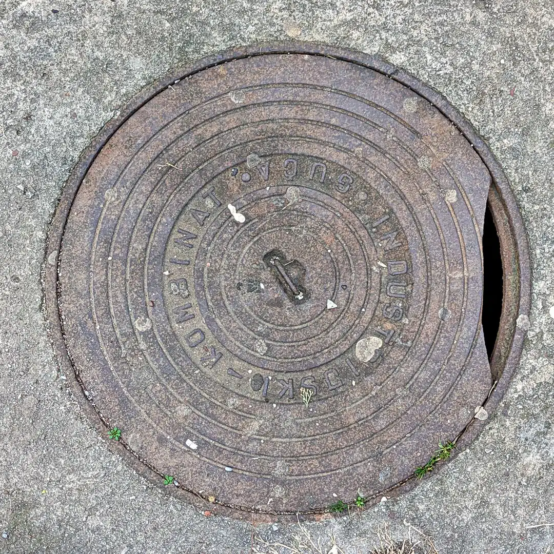Manhole Cover by IKL Livnica in Budva, Montenegro. Photo by Denis Panin