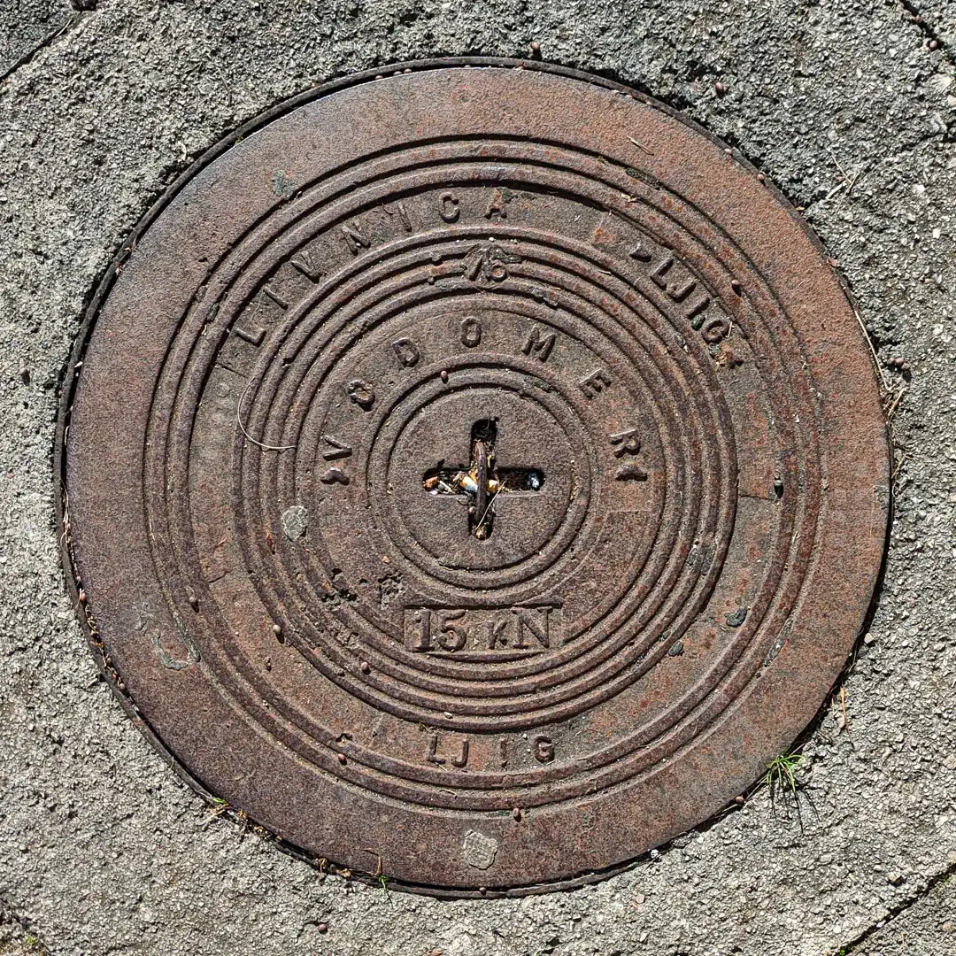 Water Manhole Cover by Livnica Ljig in Budva, Montenegro. Photo by Denis Panin