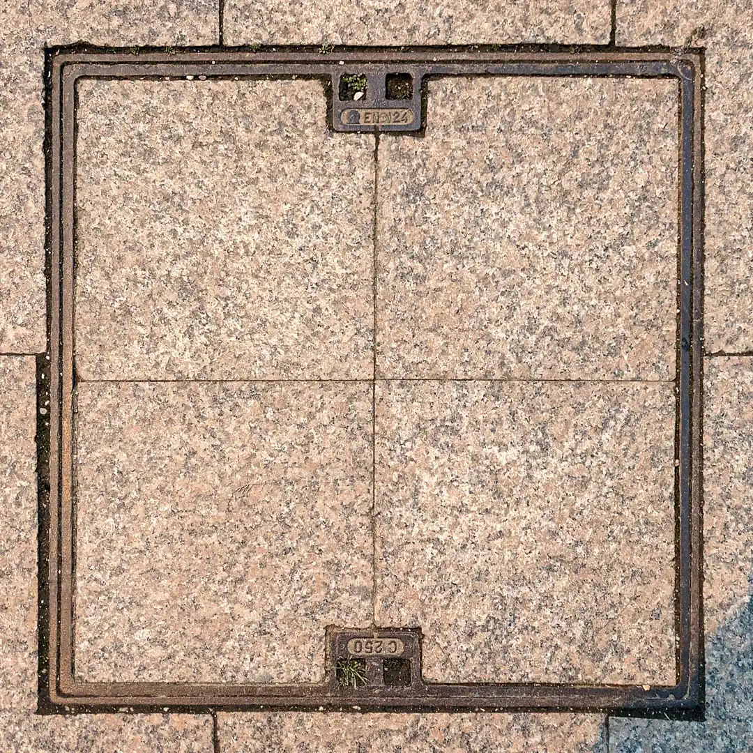 Manhole Cover in Budva, Montenegro. Photo by Denis Panin