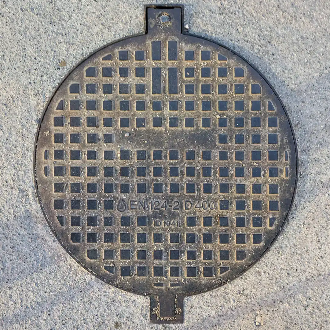 Manhole Cover in Budva, Montenegro. Photo by Denis Panin
