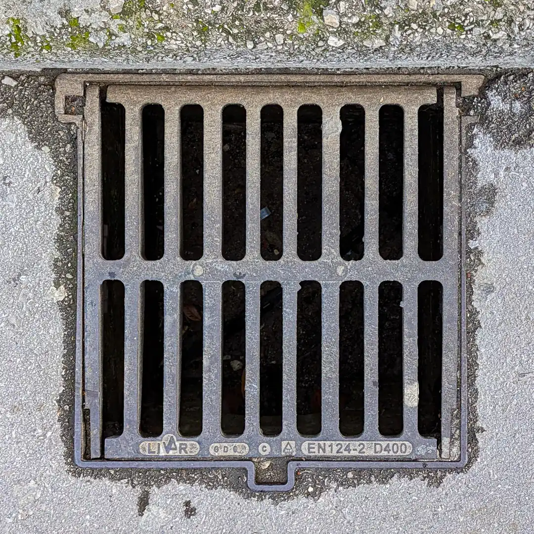 Manhole Cover by Livar in Budva, Montenegro. Photo by Denis Panin