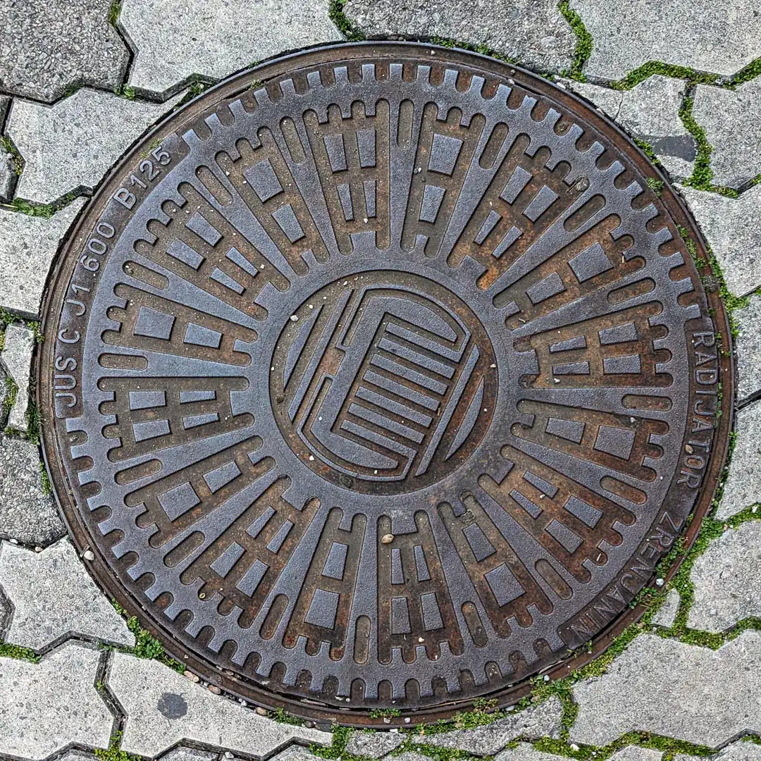 Manhole Cover by Radijator Zrenjanin in Budva, Montenegro. Photo by Denis Panin